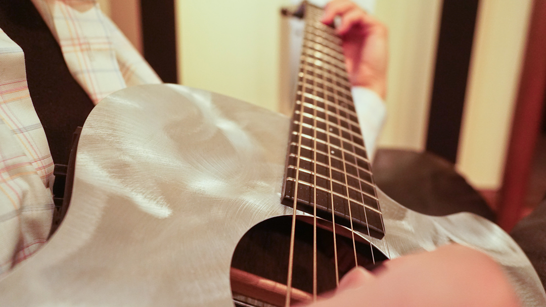 Image Of Person Playing Guitar